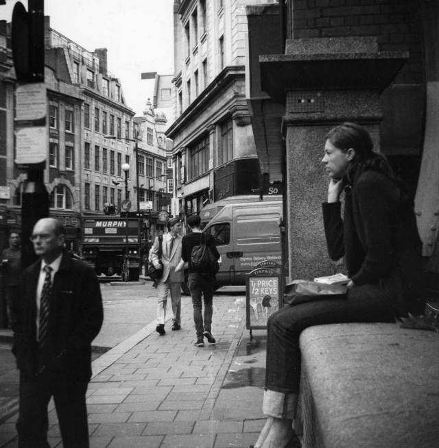 soho-wardour-street-girl-seated-on-mobile2007